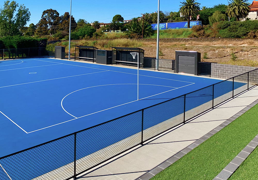Aleandra Community Oval Ararat black PVC coated netball court fencing with top and bottom rail and coaches boxes